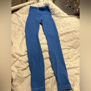 Blue lululemon leggings. Worn gently. In excellent condition. Small stain.